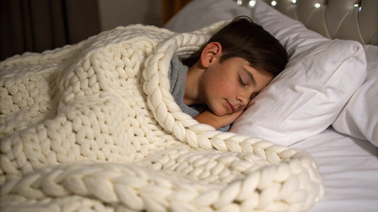 autistic boy sleeping with knitted weighted blanket