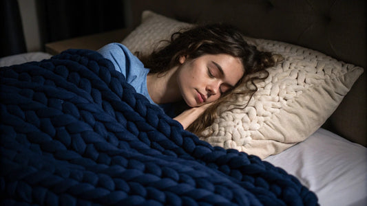 woman with knitted weighted blanket in bed